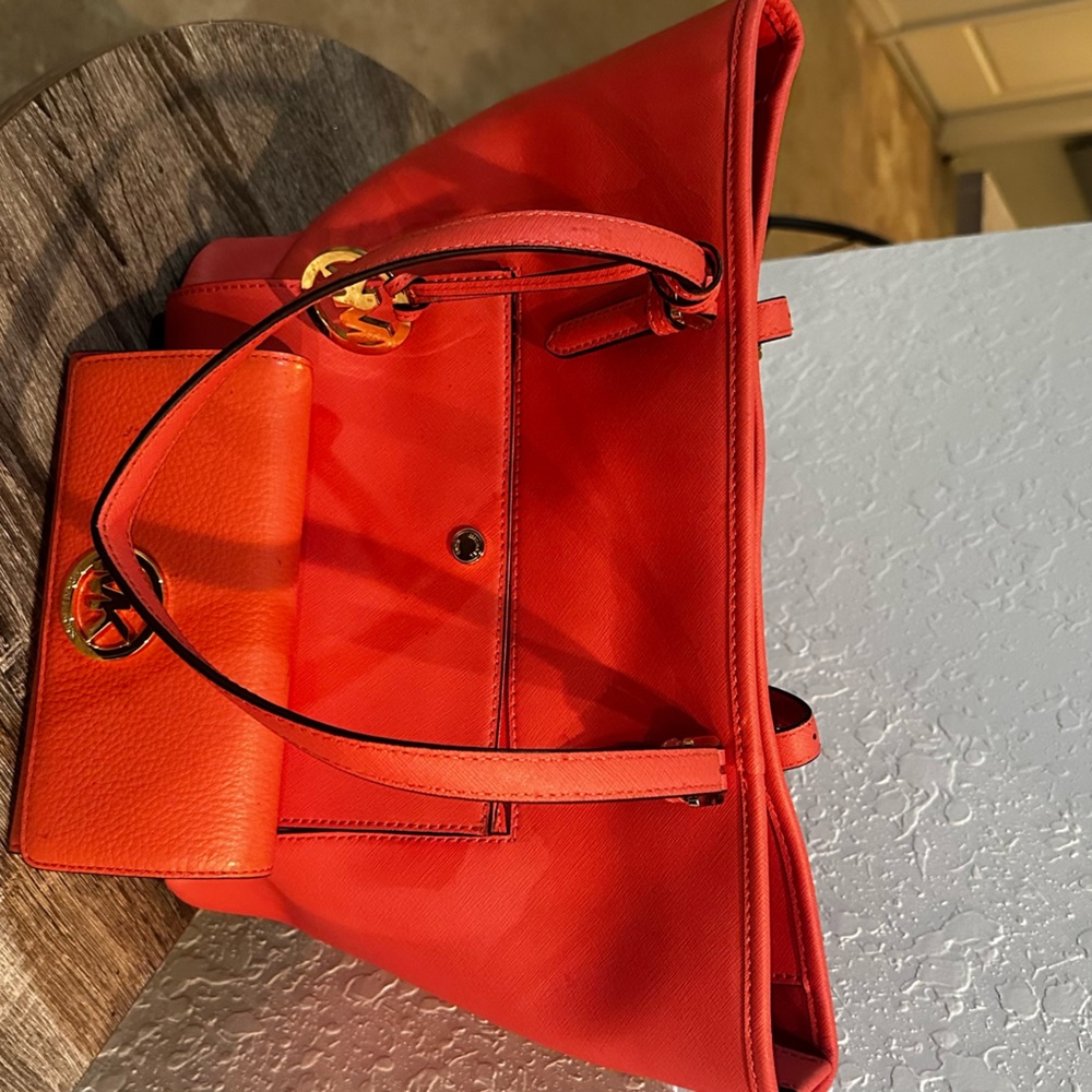 Gently used Coral Michael Kors purse and wallet